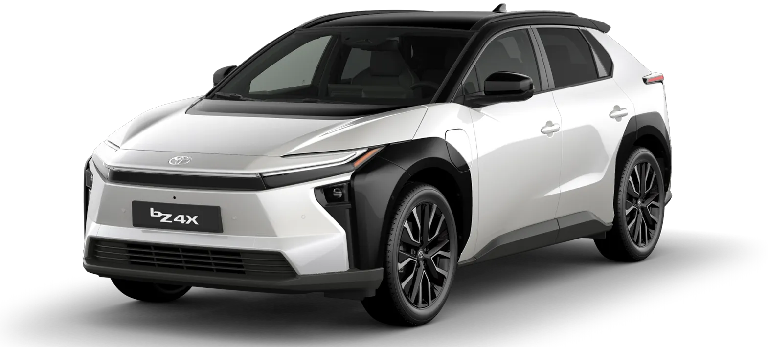 Front three-quarter view of a white Toyota bZ4X with black roof and alloy wheels, angled to show the grille and headlights.