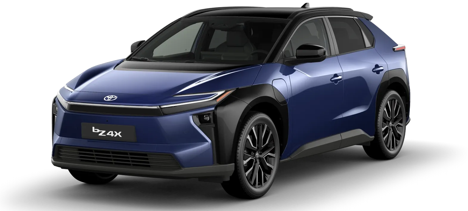 Blue Toyota bZ4X SUV photographed from front-right, showing angular headlights and black cladding on a dark background.