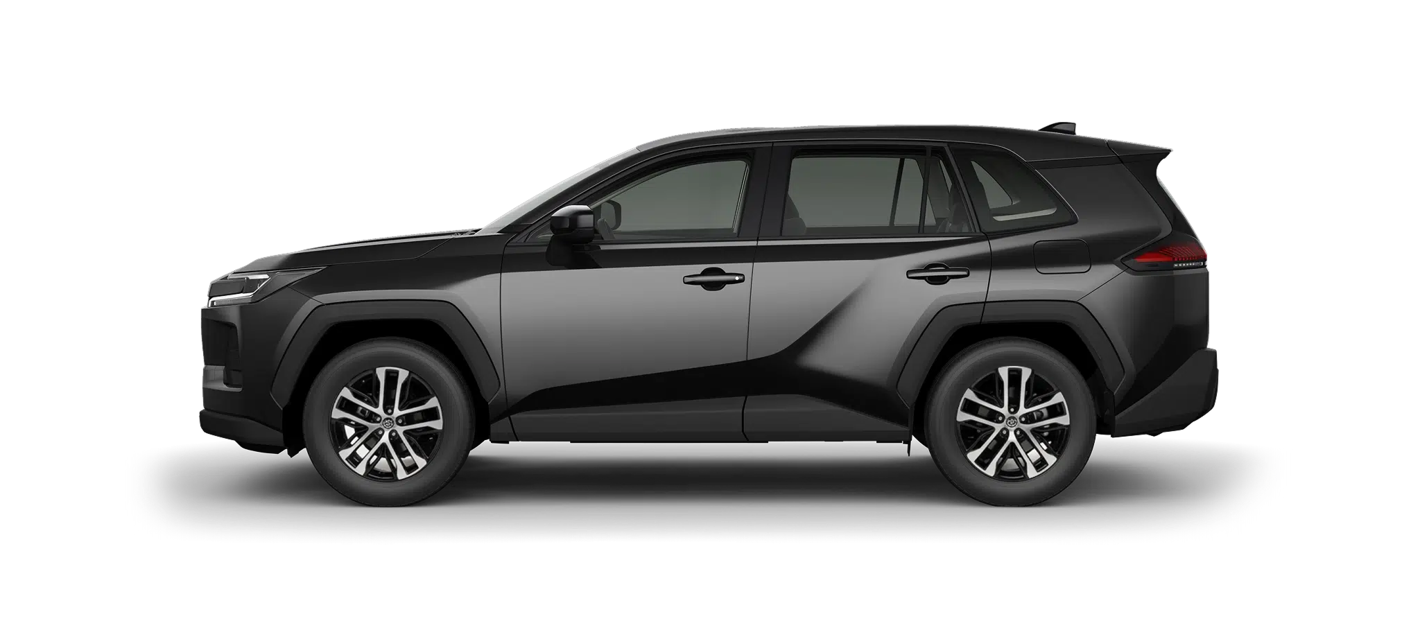 Side profile of a dark gray SUV with sculpted body lines and alloy wheels.